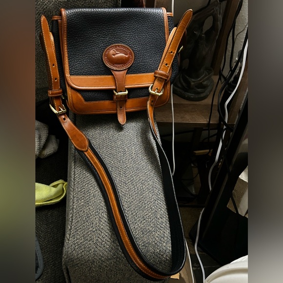 Dooney & Bourke Handbags - SOLD $65 Dooney & Bourke Vintage Crossbody/Shoulder Bag. All Weather Leather.
